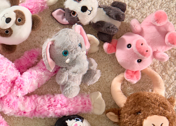 Plush stuffed animal toys including elephant, pig, panda and cow