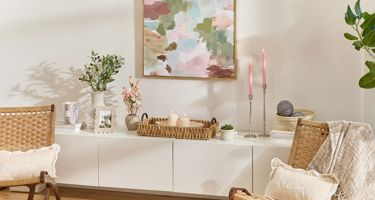 Home Shores decor collection for spring: driftwood decor, coastal pillows, beachy wall art, rattan mirror, floral, candleholders & more.