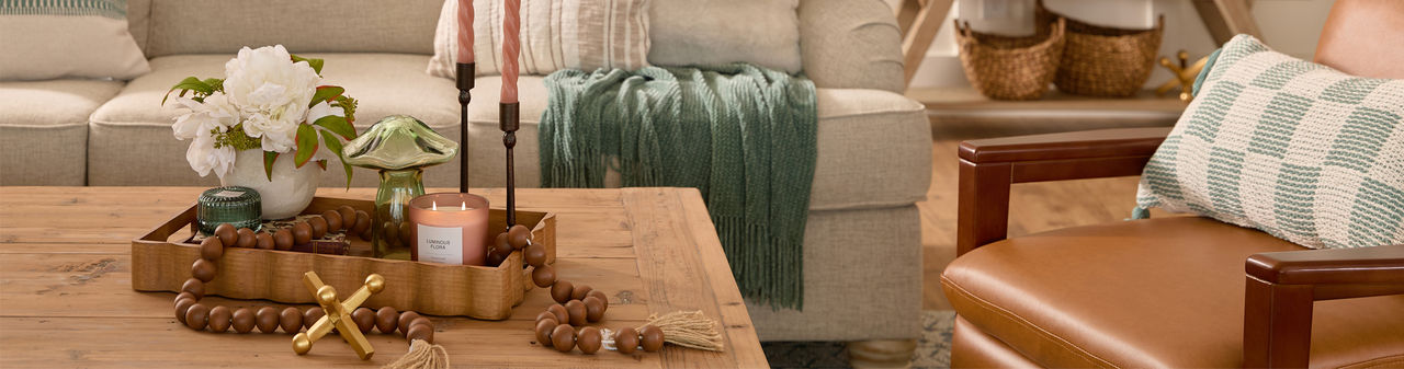 Spring home decor from pOpshelf: pillows, gold decorative bird cage, large glass candleholders, wooden tray, large lantern, wall art & more.