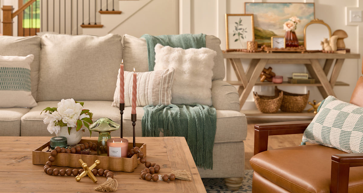 Spring home decor from pOpshelf: pillows, gold decorative bird cage, large glass candleholders, wooden tray, large lantern, wall art & more.