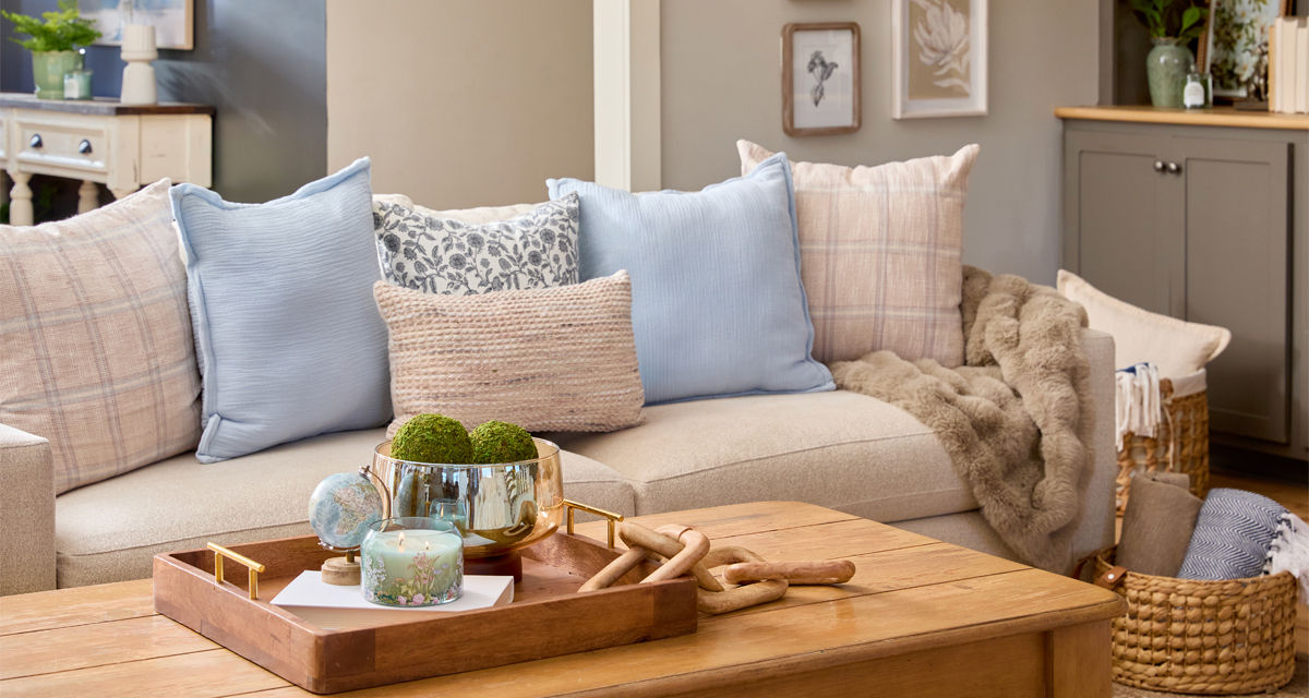 Spring home decor from pOpshelf: pillows, gold decorative bird cage, large glass candleholders, wooden tray, large lantern, wall art & more.