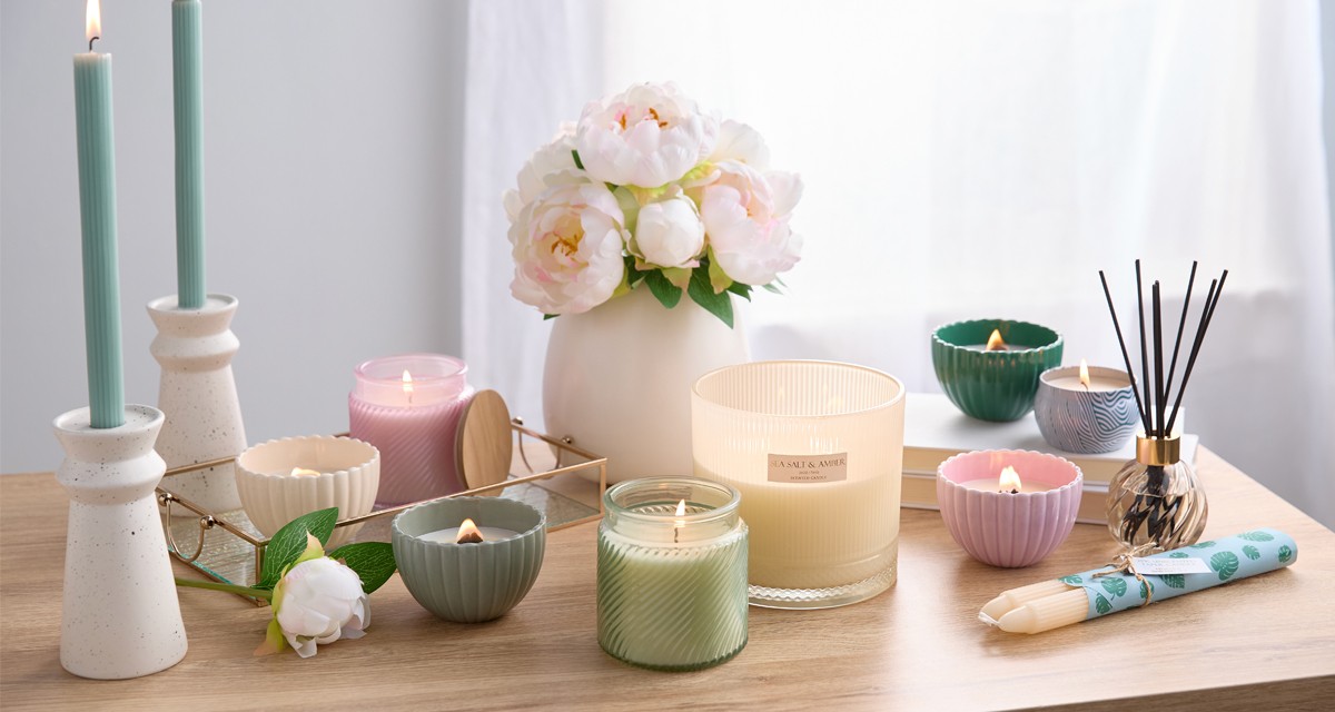 Spring candles and fragrances from pOpshelf: scented container candles, tin candles, candlesticks, and reed diffusers.