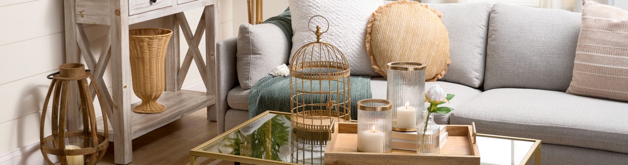 Spring home decor from pOpshelf: pillows, gold decorative bird cage, large glass candleholders, wooden tray, large lantern, wall art & more.