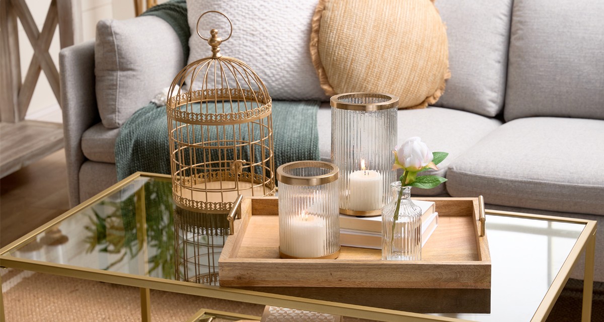 Spring home decor from pOpshelf: pillows, gold decorative bird cage, large glass candleholders, wooden tray, large lantern, wall art & more.