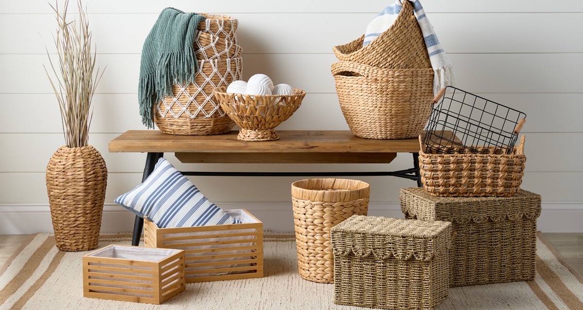 Decorative natural woven baskets, wooden boxes, and wire baskets with wooden handles from pOpshelf.
