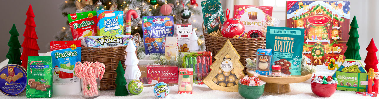 Christmas candy, treats & snacks: Holiday Yums, Peelerz, Lindor Lindt, Ghiradelli, and Ferrero Rocher chocolates, Hershey's kisses, PEZ candy, candy canes, merci chocolates, cookie pops & more.