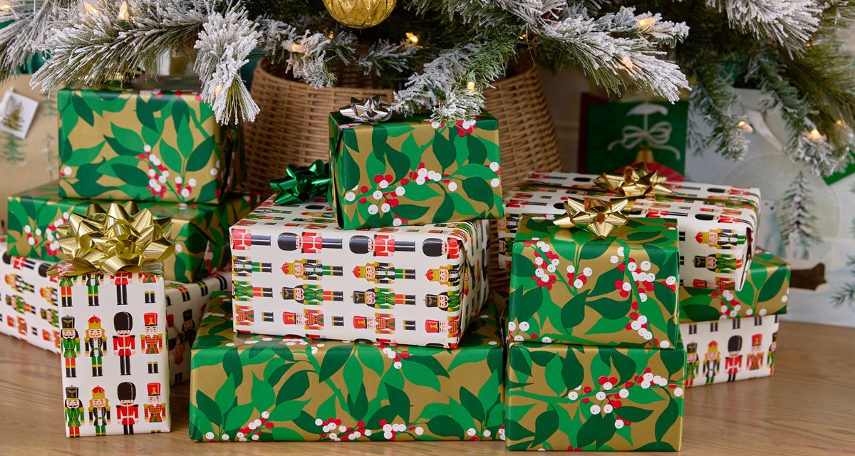 Festive Christmas gift wrap and boxes in assorted designs.