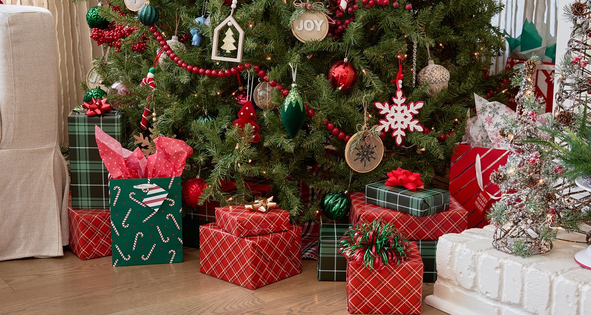 Christmas trim-a-gift with festive and affordable gift wrap, Christmas gift bags, tags, ribbon & bows.