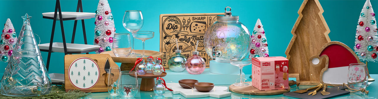 Gift ideas for the entertainer from pOpshelf: wine glasses, wooden charcuterie boards, glitter drink bomb & more.