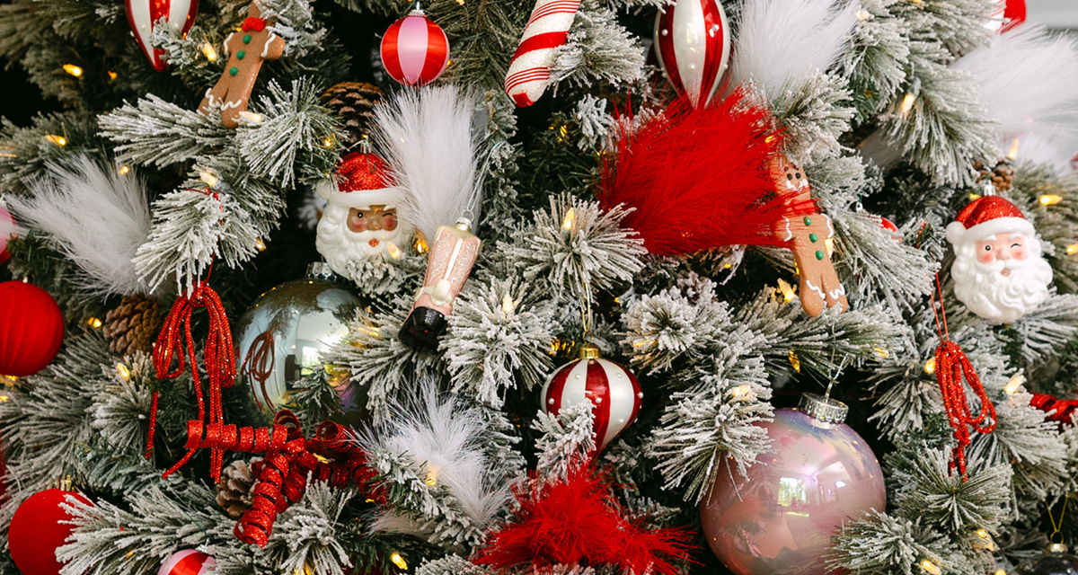 Christmas tree decorated with a variety of ornaments from pOpshelf.