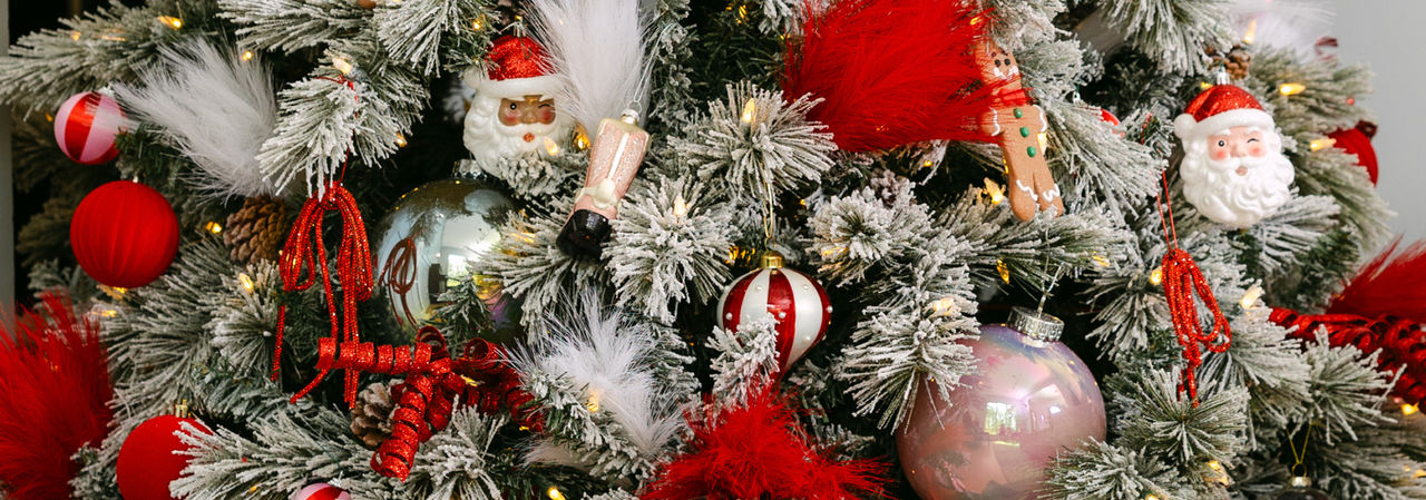 Christmas tree decorated with a variety of ornaments from pOpshelf.