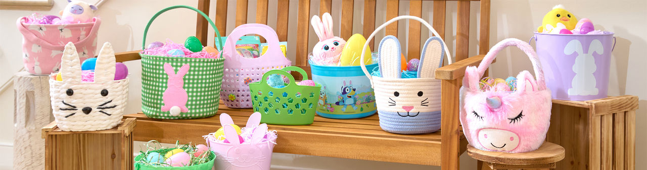 Various Easter basket styles from pOpshelf filled with Easter grass and eggs.