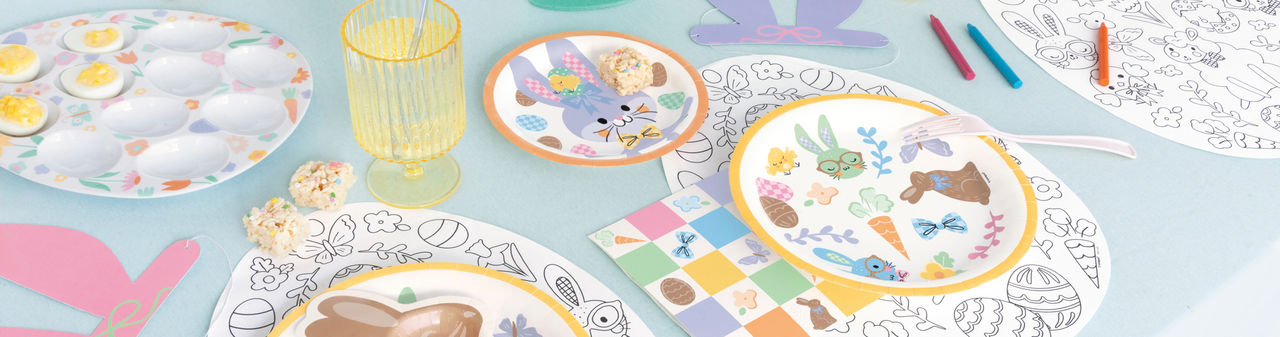 Easter party supplies from pOpshelf: coloring book style placemats, bunny-shaped plates, bunny-themed round paper party plates, bunny ear glasses, egg plate & more.