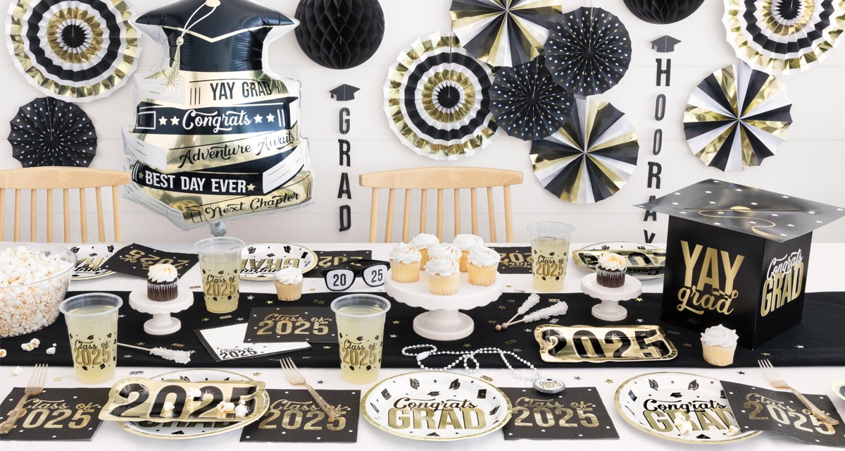 2025 graduation party table with grad plates, napkins, cups, decorations, balloons & more from pOpshelf.