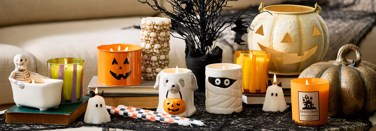 Cute ghost-shaped candles, bat taper candles, colorful jar candles & more from pOpshelf.
