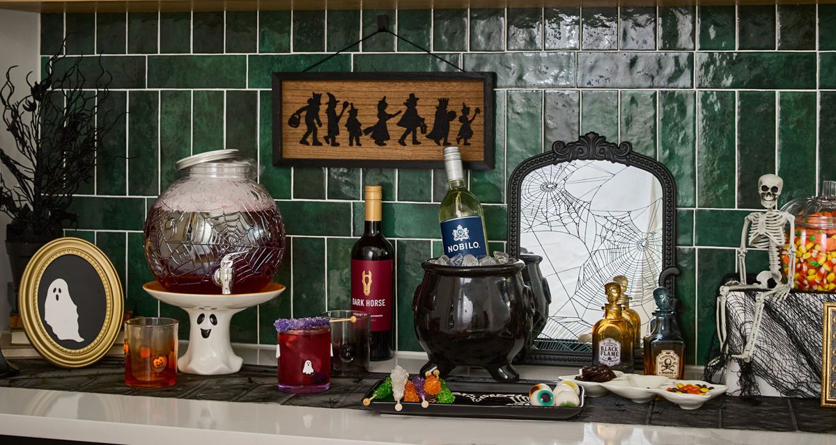 Halloween houseware from pOpshelf: drink dispenser, ghost cake stand, icon Halloween glasses, and more.