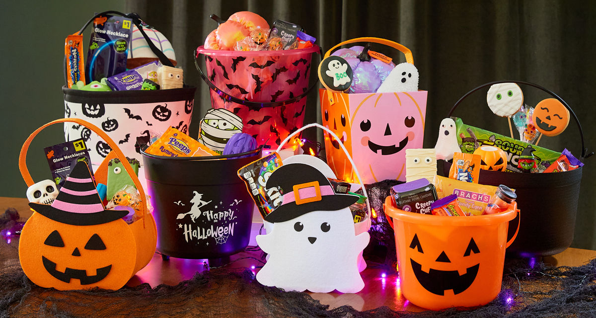 Halloween trick-or-treat buckets and pails filled with candy and goodies from pOpshelf. 