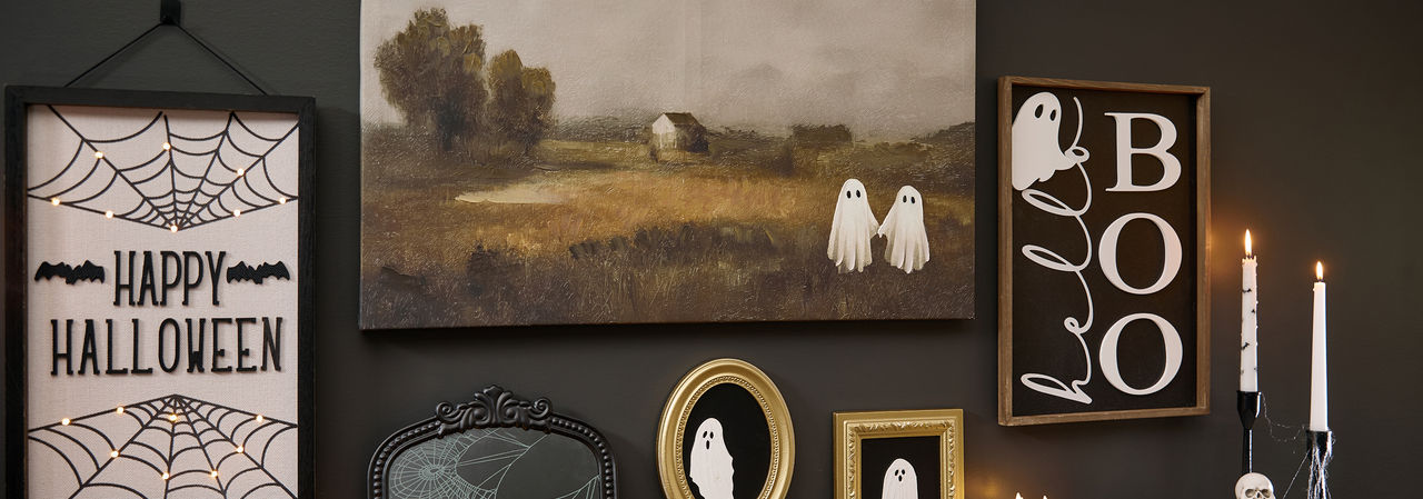 Various Halloween signs and wall art from pOpshelf.
