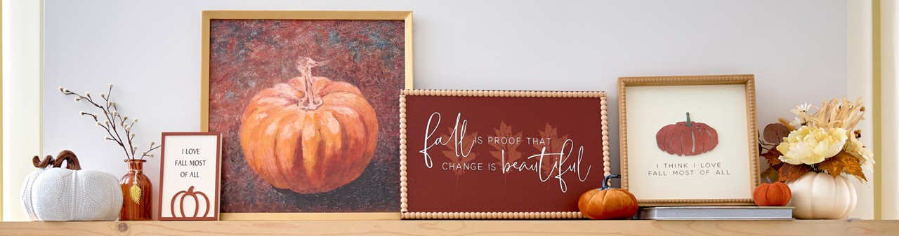 Fall wall signs in various designs with pumpkins and fall sentiments on a fireplace mantel.