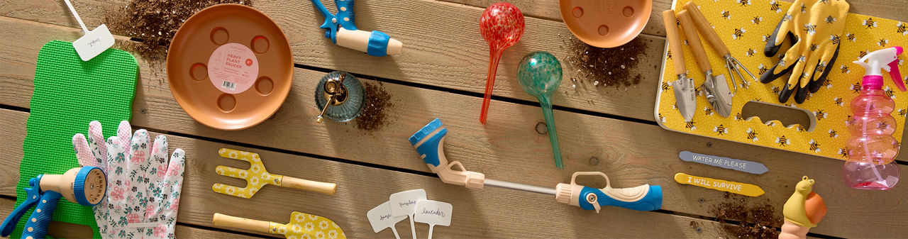 Gardening tools, gloves, gardening accessories, water misters, and hose attachements from pOpshelf