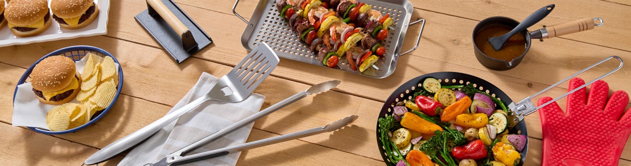 Grilling tools and accessories from pOpshelf: grill pan, grill sheet, long-handled tongs, spatula, burger press & more.