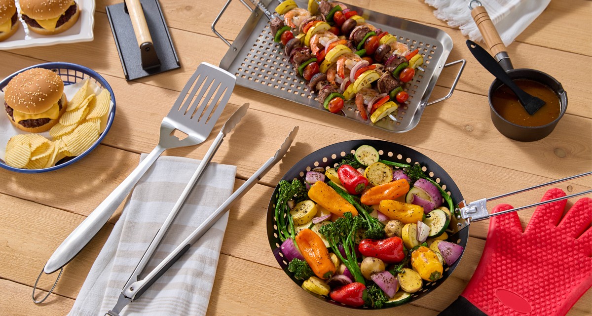 Grilling tools and accessories from pOpshelf: grill pan, grill sheet, long-handled tongs, spatula, burger press & more.
