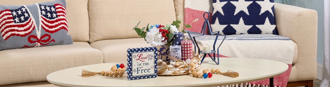 Patriotic home decor from pOpshelf: flag and star pillows, patriotic wall decor, flag decor, metal hanging stars, and more.