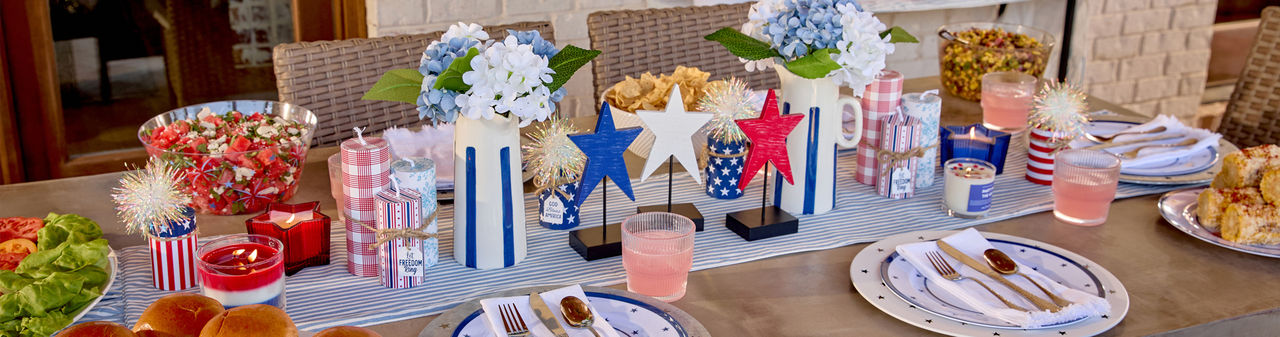 Table set with red, white & blue patriotic party supplies from pOpshelf.