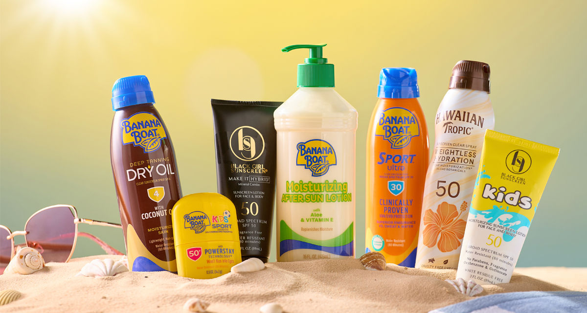 Sunscreen for the family in the sand at the beach.