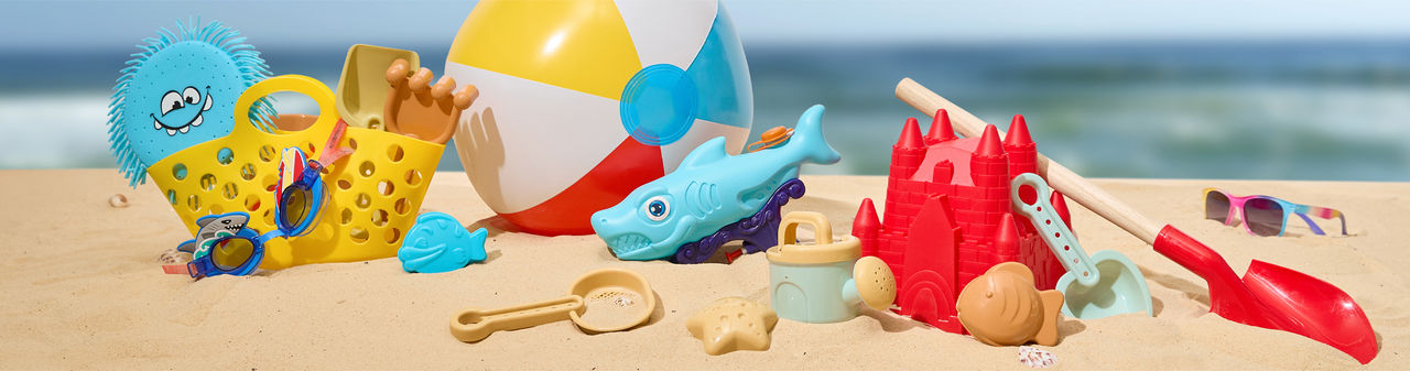 Sand pail, sandcastle bucket, sand sifters, shovels, sand molds, and water toys from pOpshelf.