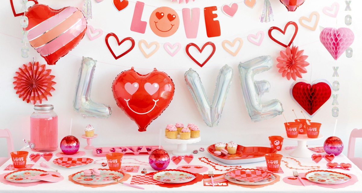 Valentine's party supplies from pOpshelf: paper party supplies, heart sippy cups, LOVE balloons, heart foil backdrop, favor bags, and more. 