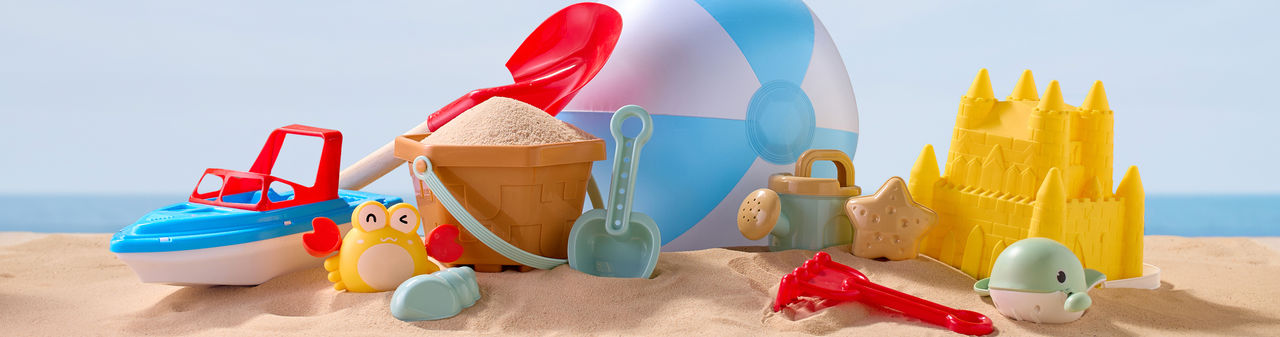 Sand pail, sandcastle bucket, sand sifters, shovels, sand molds, and water toys from pOpshelf.