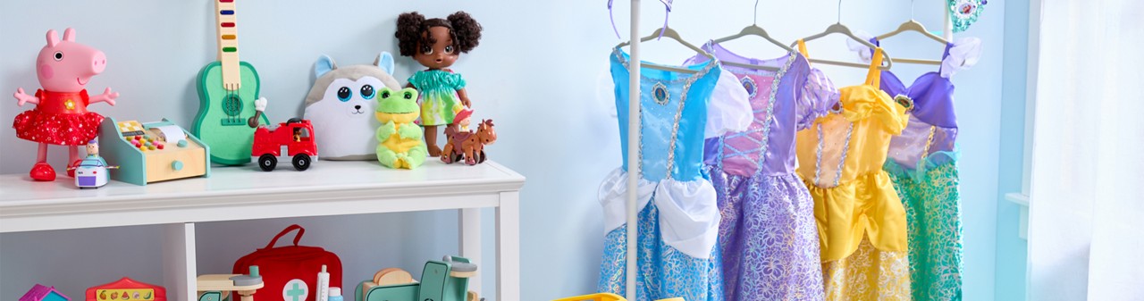 Preschool playroom with Disney Pricess dress-up costumes, Pepp Pig toys, Bluey toys, wooden pretend play toys, Play-Doh, Crayola, Disney Hooyay, lego, dolls, Ty plush & more.