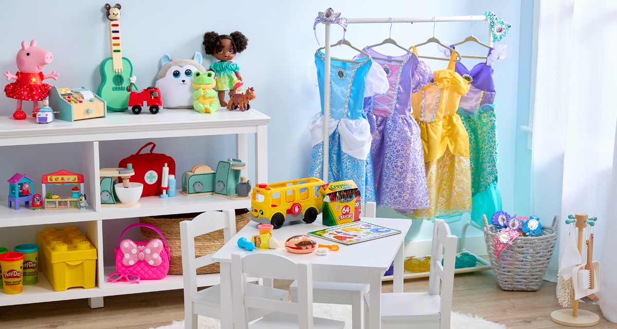 Preschool playroom with Disney Pricess dress-up costumes, Pepp Pig toys, Bluey toys, wooden pretend play toys, Play-Doh, Crayola, Disney Hooyay, lego, dolls, Ty plush & more.
