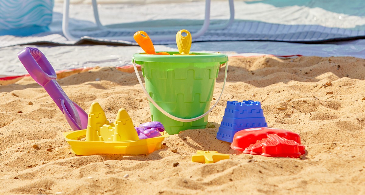 Stacking sand toy set with sand pail, sand sifters, and sand molds from pOpshelf.