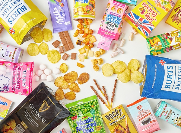 variety of snack foods opened with products coming out on tabletop