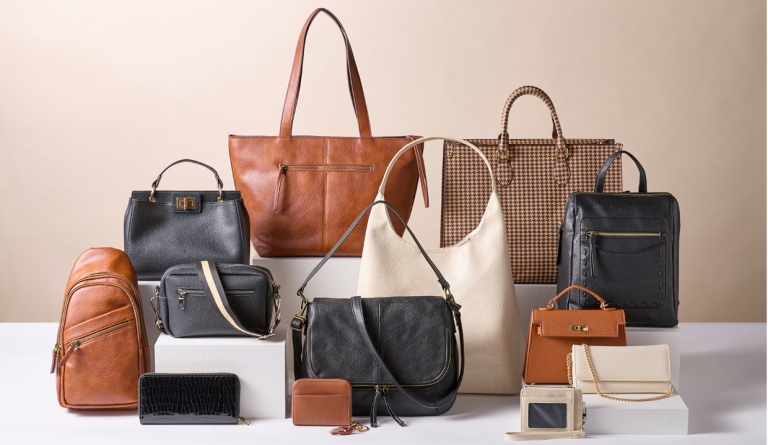 Collection of handbags, purses & wallets in brown, black, and white colors from pOpshelf.