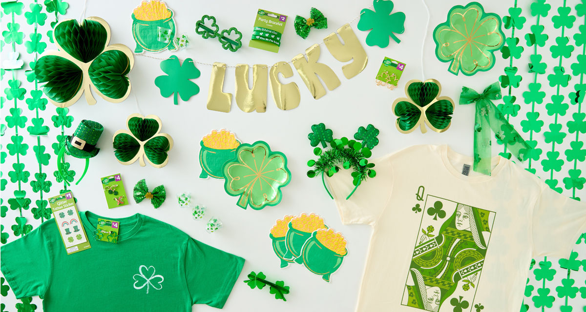 St. Patrick's Day party supplies: rainbow and shamrock plates, green beer mugs, necklaces, shamrock wall garland, pot-of-gold napkins & more.