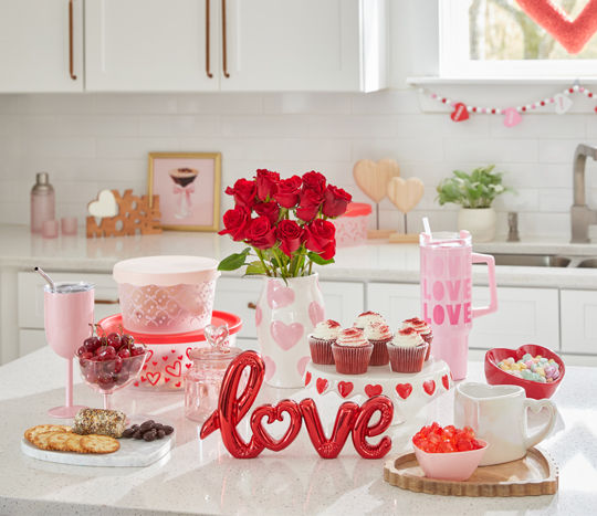 Valentine's Day kitchen decor inclusing charcuterie boards, cake stand, heart mugs, love decor, heart shaped dish and more