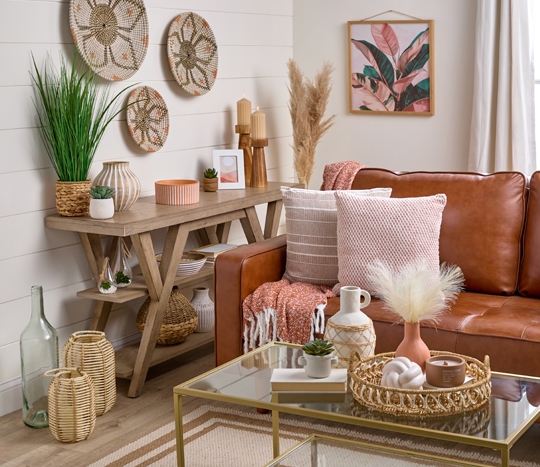 New warm neutrals decor collection: natural lanterns, wall hangings in multiple sizes, cansles, pillows, throw, vases & more.
