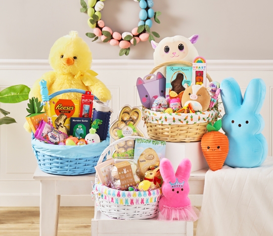 Three wicker fabric-lined Easter baskets stuffed full of candy, Easter plush, and Easter basket stuffers from pOpshelf..